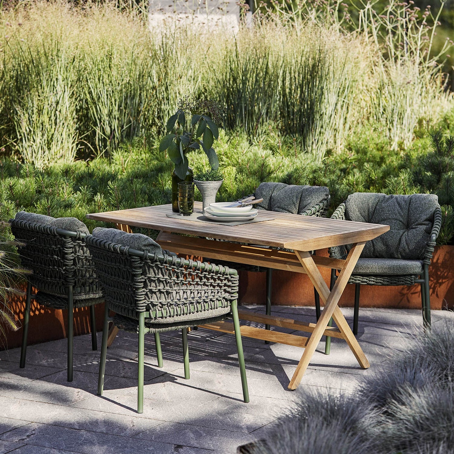 Cane-line Flip folding table in a Danish outdoor setting