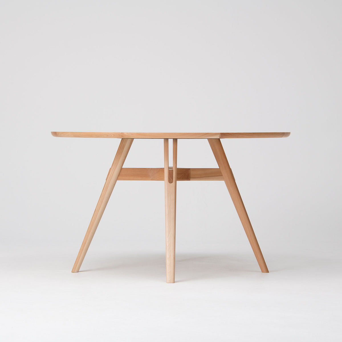 CondeHouse YON round table in natural Japanese birch with chairs (shown in the 47 1/4 in size)