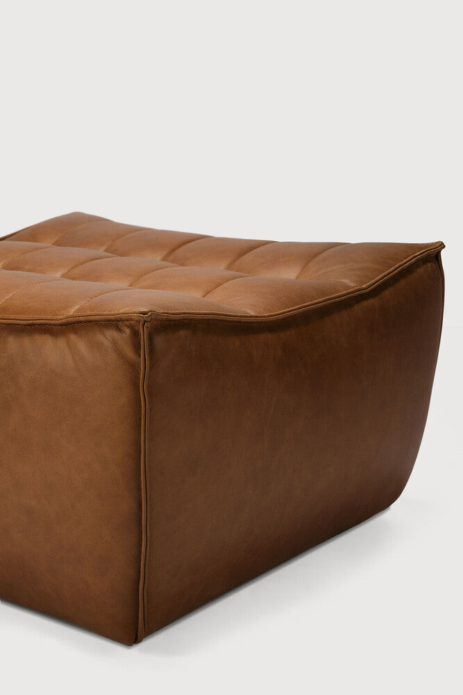 Ethnicraft N701 leather ottoman in brown, modern seating detail by Comosum