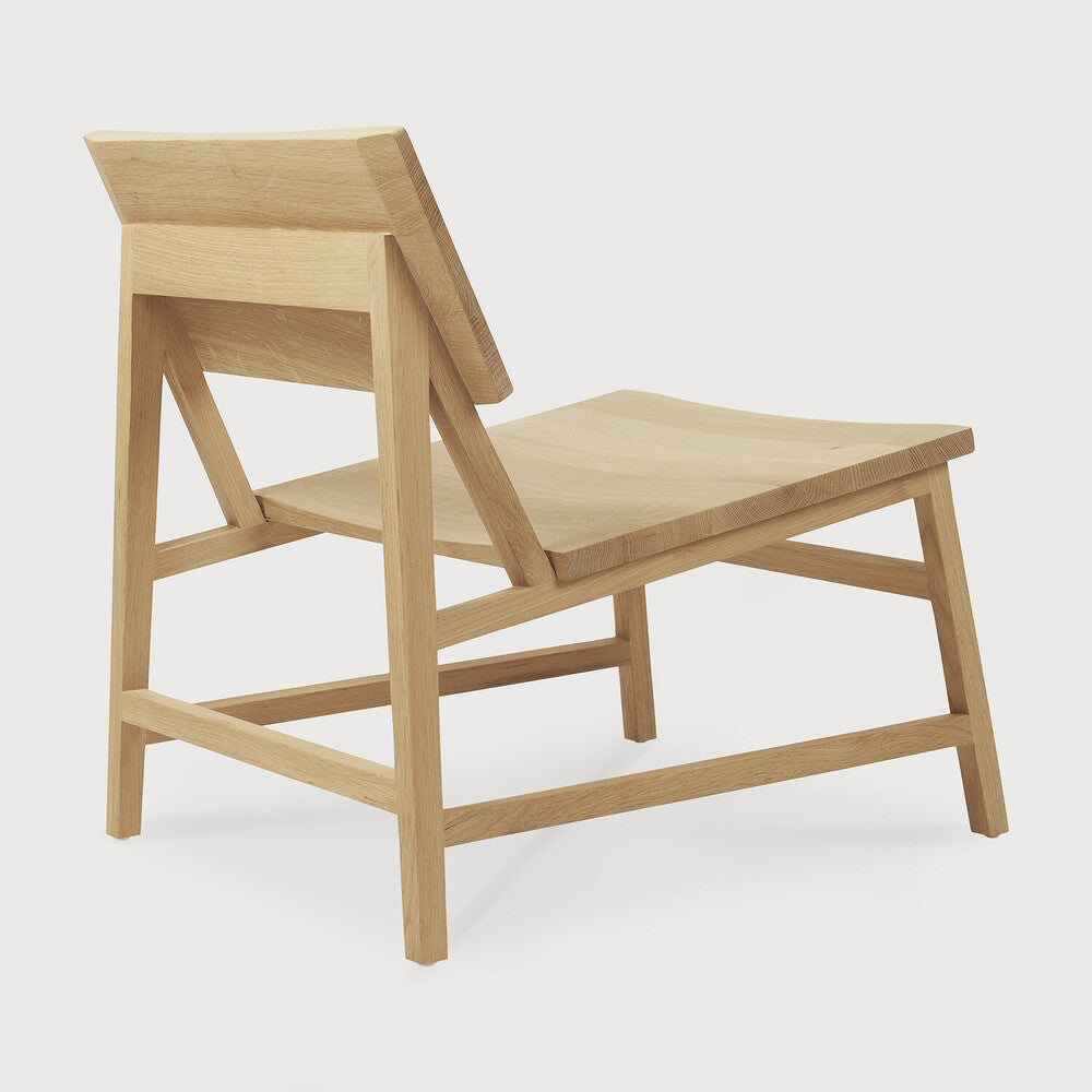 Minimalist oak N2 Lounge Chair by Ethnicraft, sustainable wooden seating design by Comosum