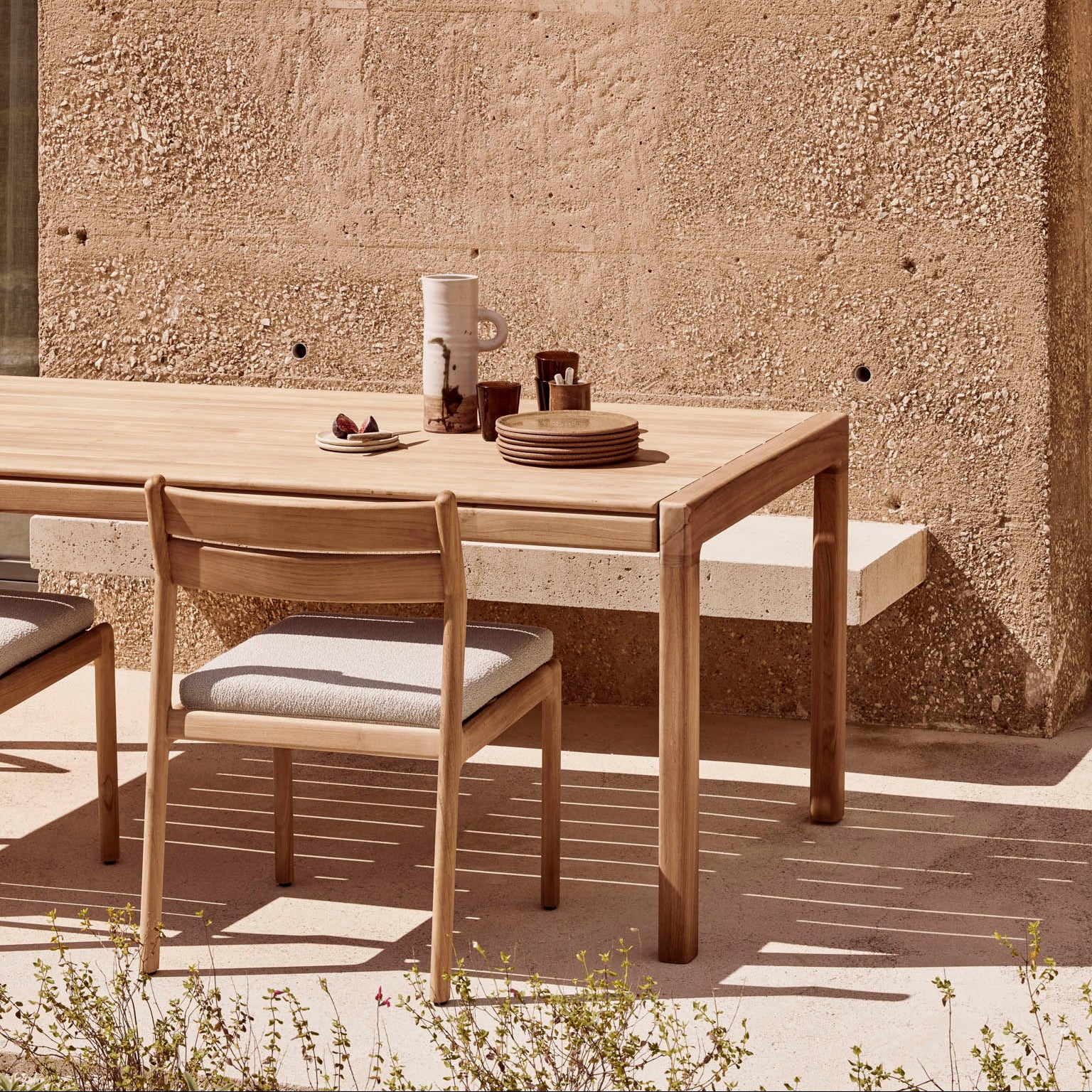 Ethnicraft Jack Outdoor Dining Chair Frame styled in a dining room