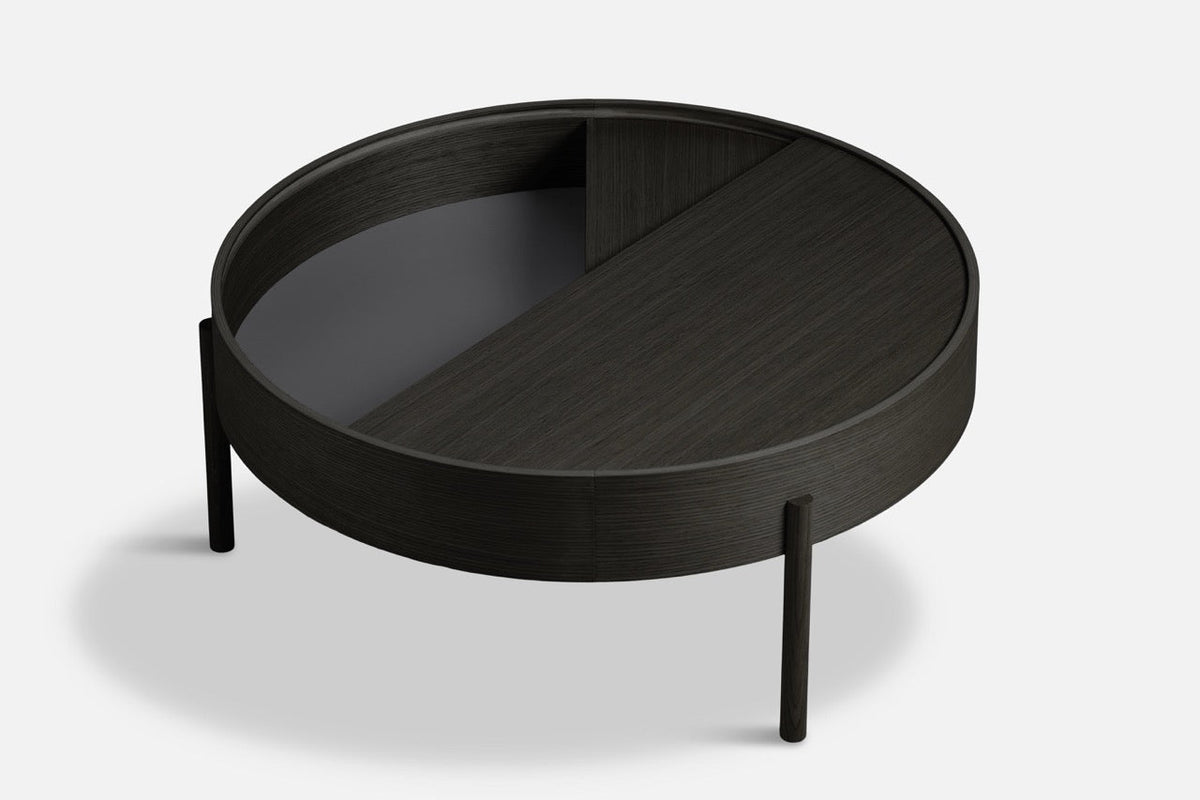 WOUD Arc Coffee Table in black painted ash with the top turned to reveal the nanolaminate-lined storage