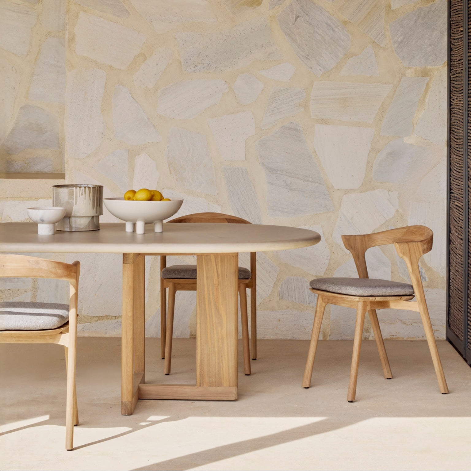 Ethnicraft Trestle Outdoor Dining Table in teak styled in a dining room