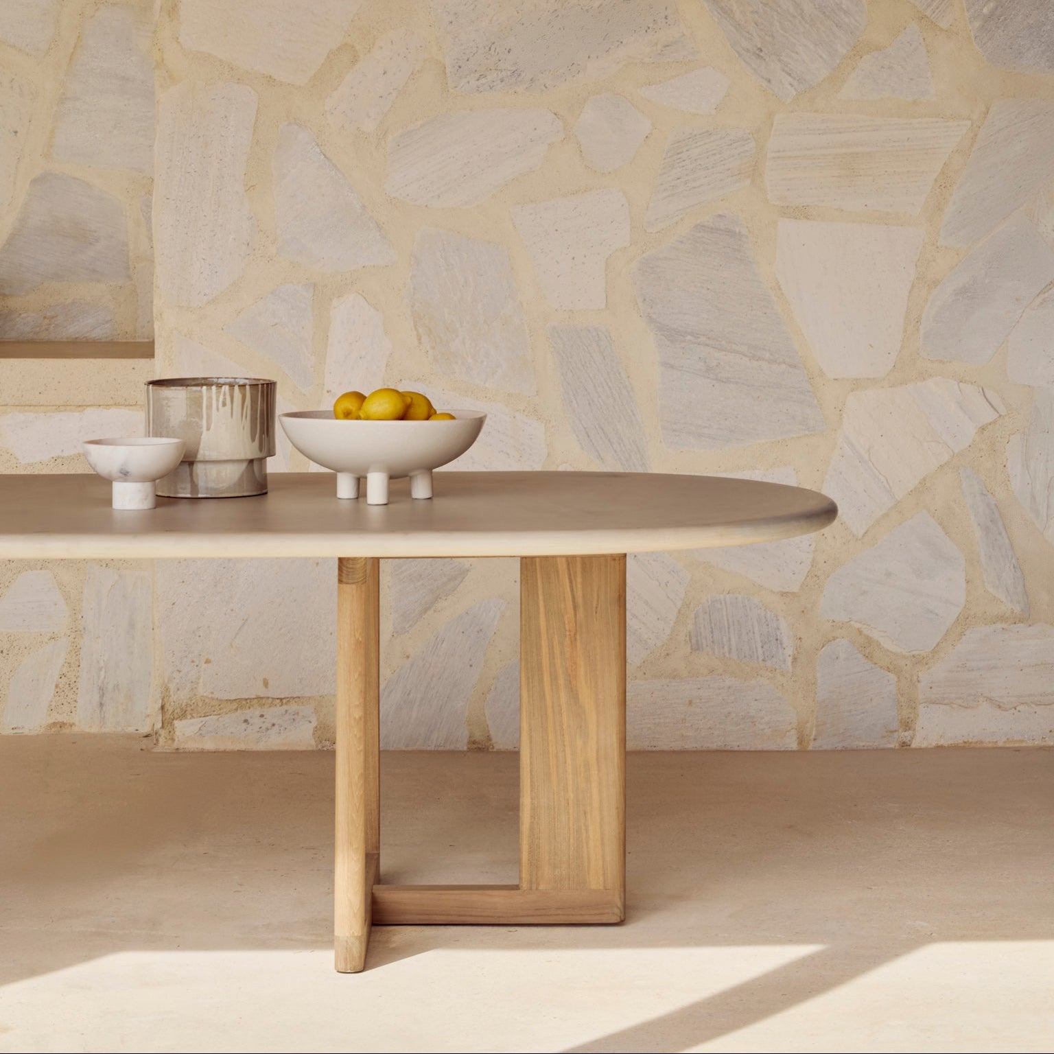 Ethnicraft Trestle Outdoor Dining Table in teak styled in a dining room