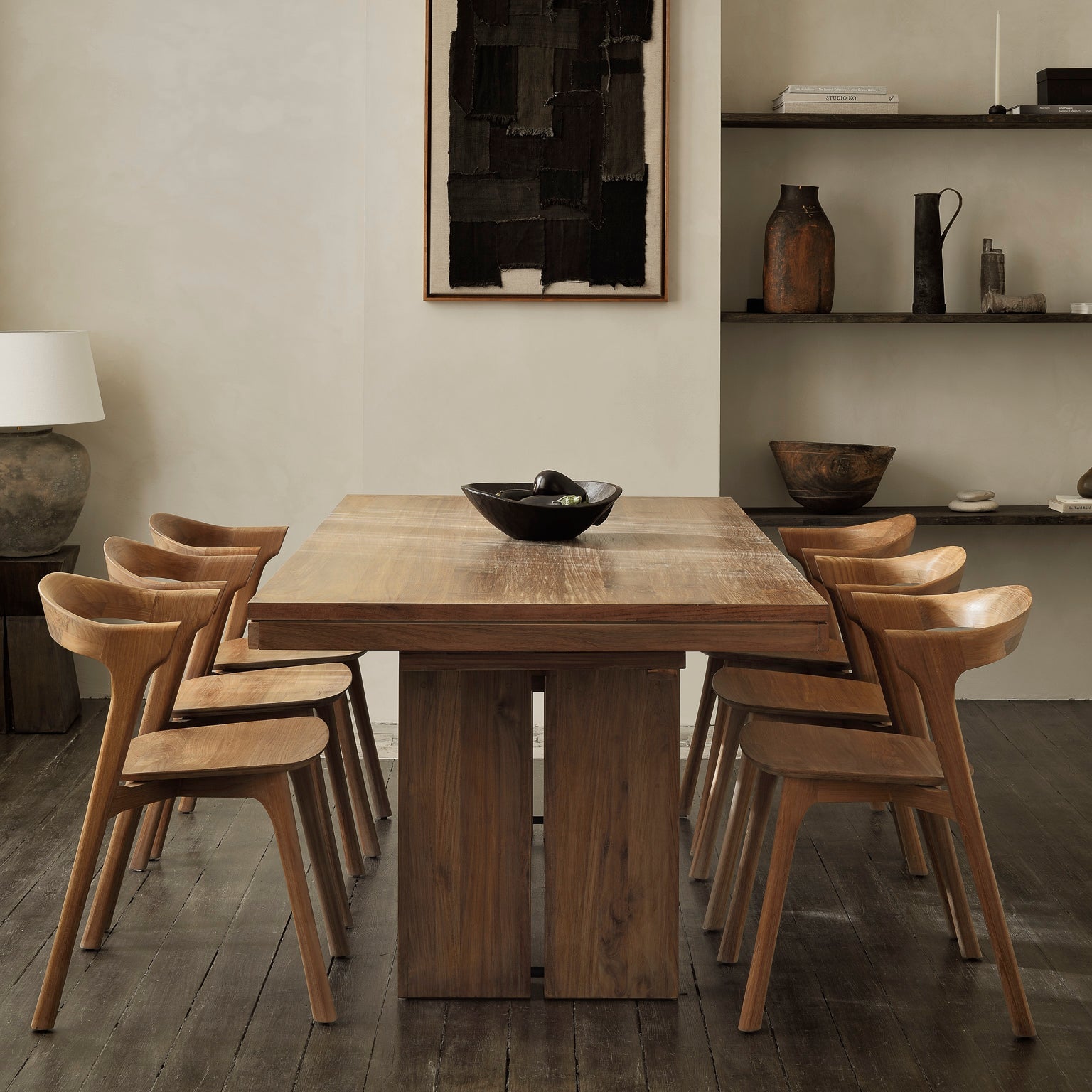 Ethnicraft Double Extendable Dining Table in teak styled in a dining room