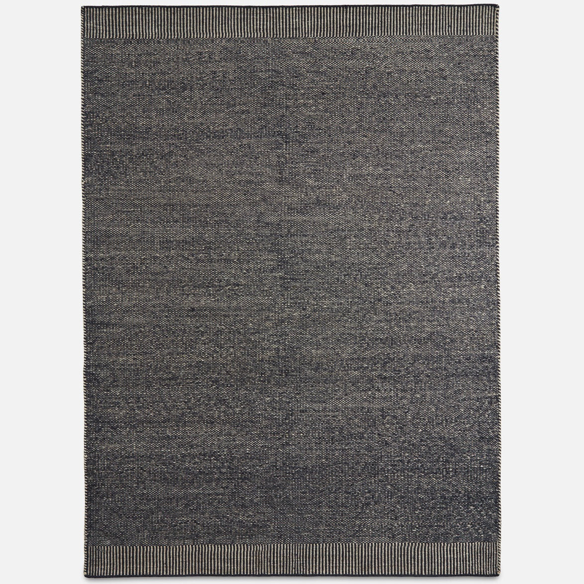 WOUD Rombo Rug in hand-tufted wool designed by Studio Tolvanen, Danish design