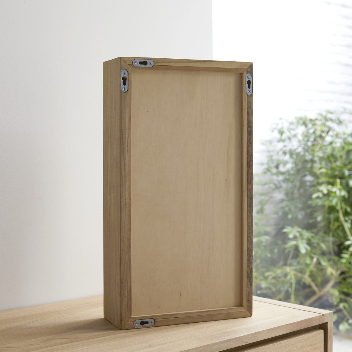 Tikamoon Stelle bathroom mirror in solid teak, side profile showing the frame depth