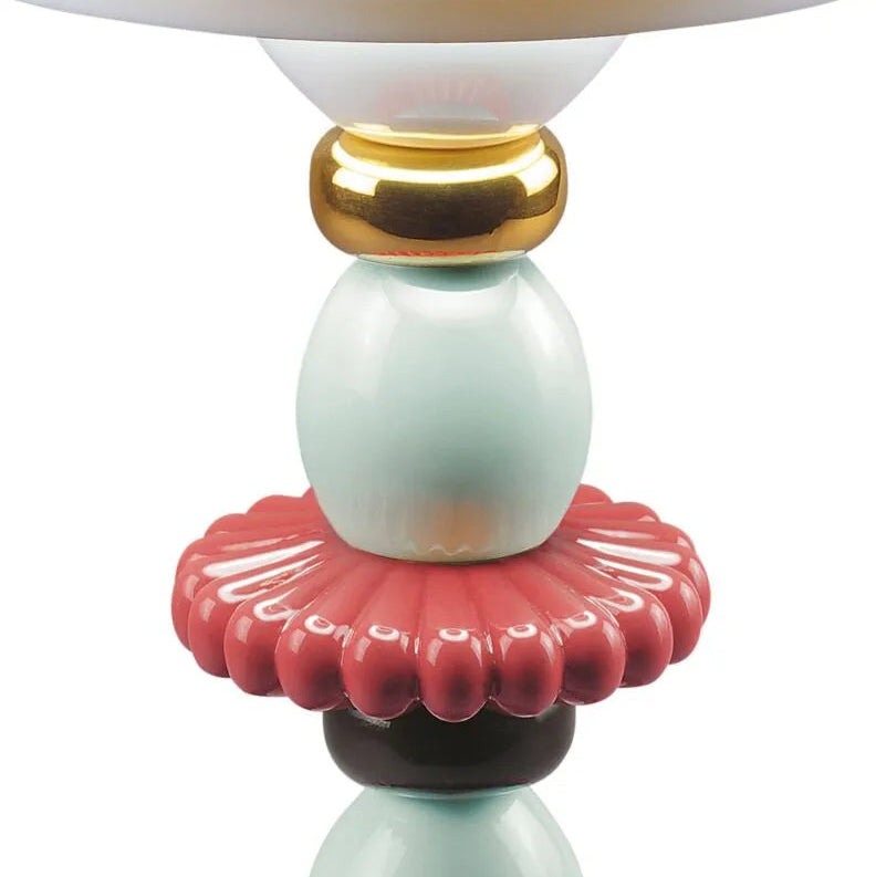 Lladró Lotus Firefly Table Lamp in handcrafted porcelain, from the Firefly collection, handcrafted in Valencia since 1953.