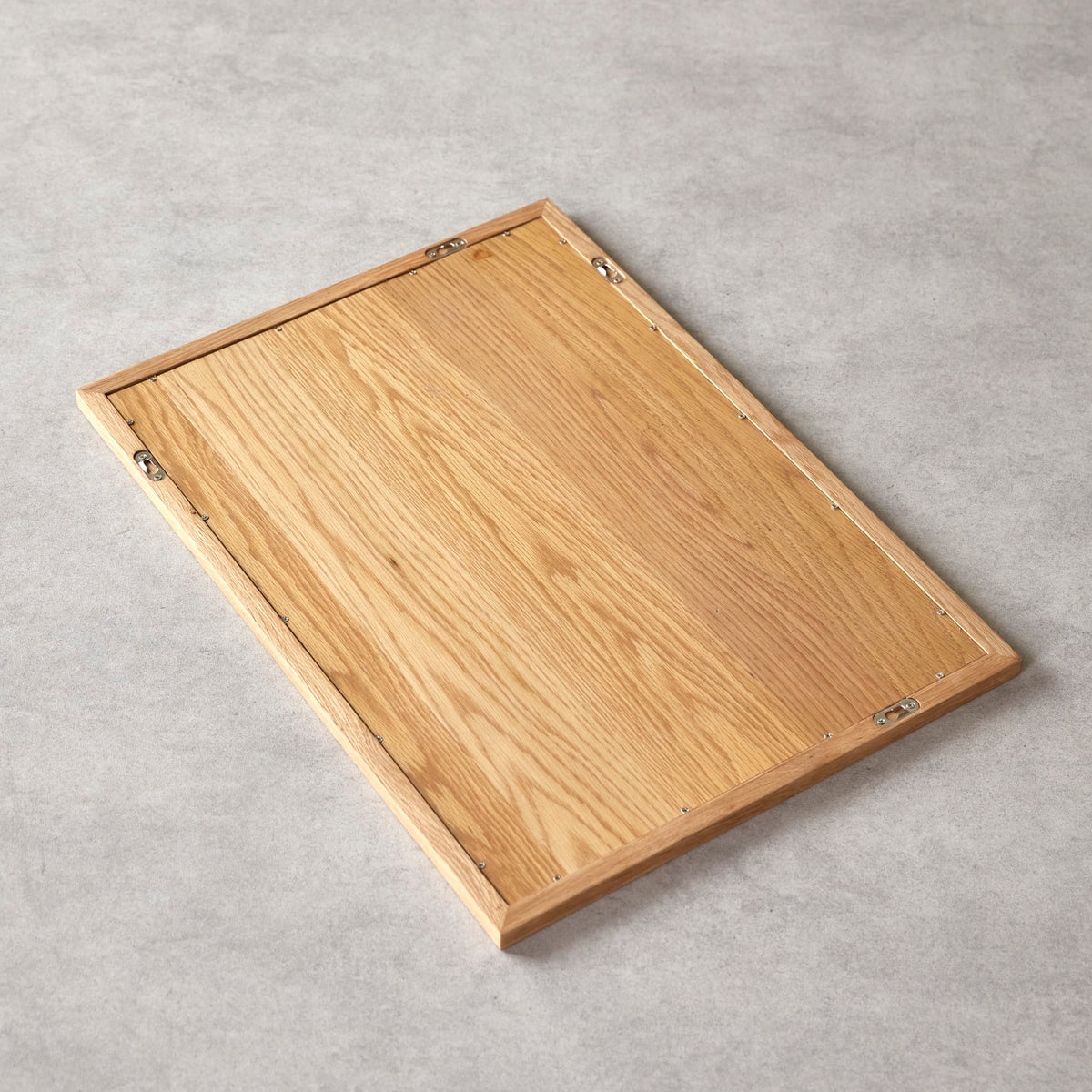 Serena oak mirror, close-up of the brushed and oiled frame