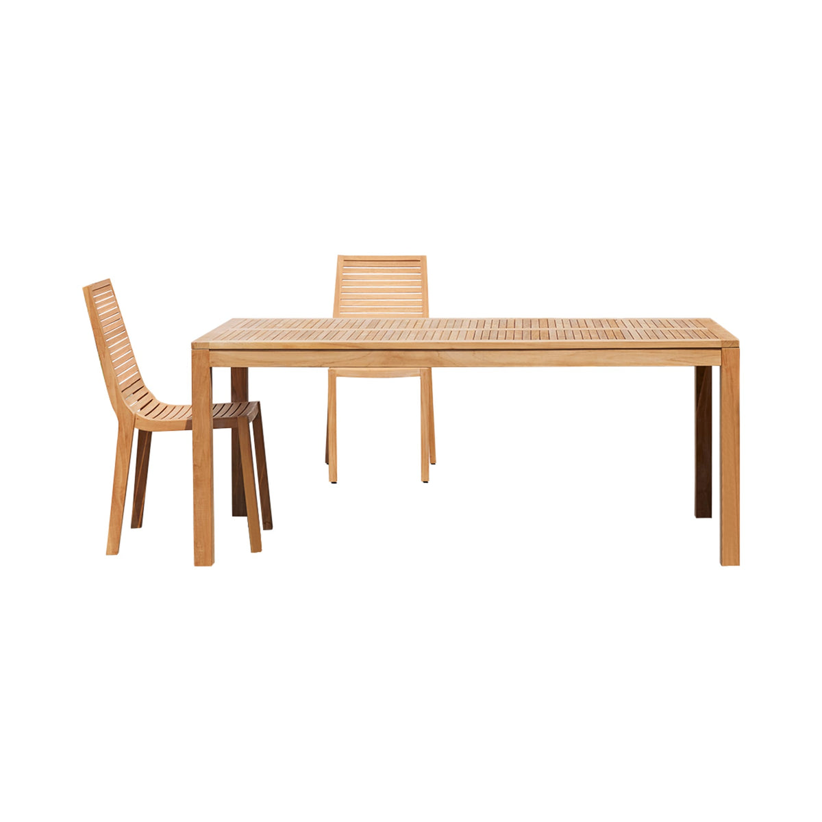 Tikamoon Teo teak outdoor dining table styled outdoors set for a meal