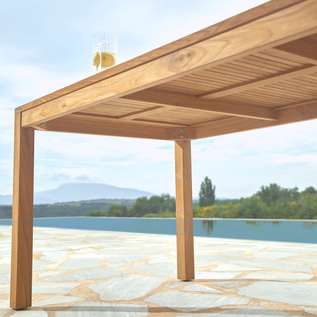 Tikamoon Teo teak garden table, front view