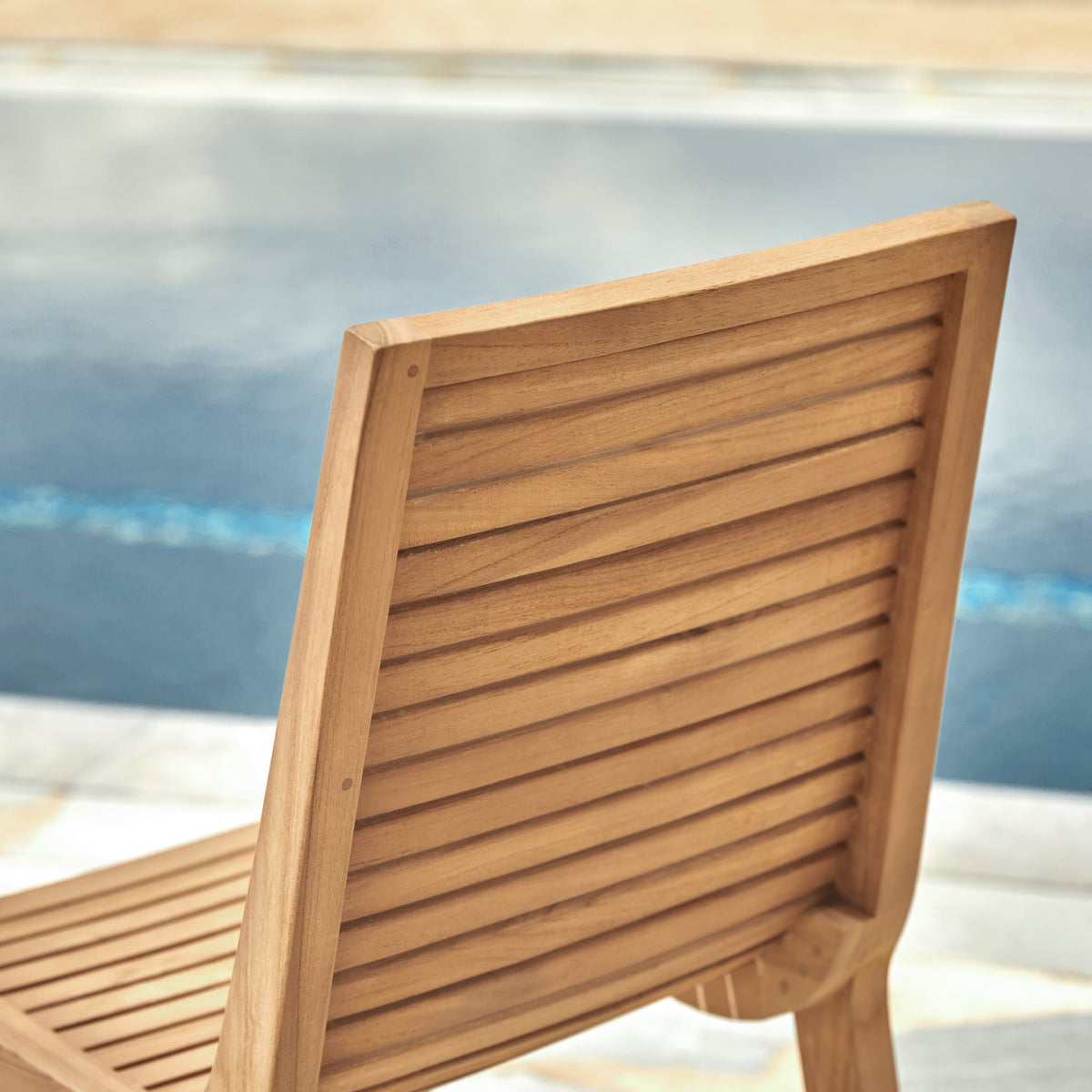 Tikamoon Teo outdoor dining chair in solid teak, side profile
