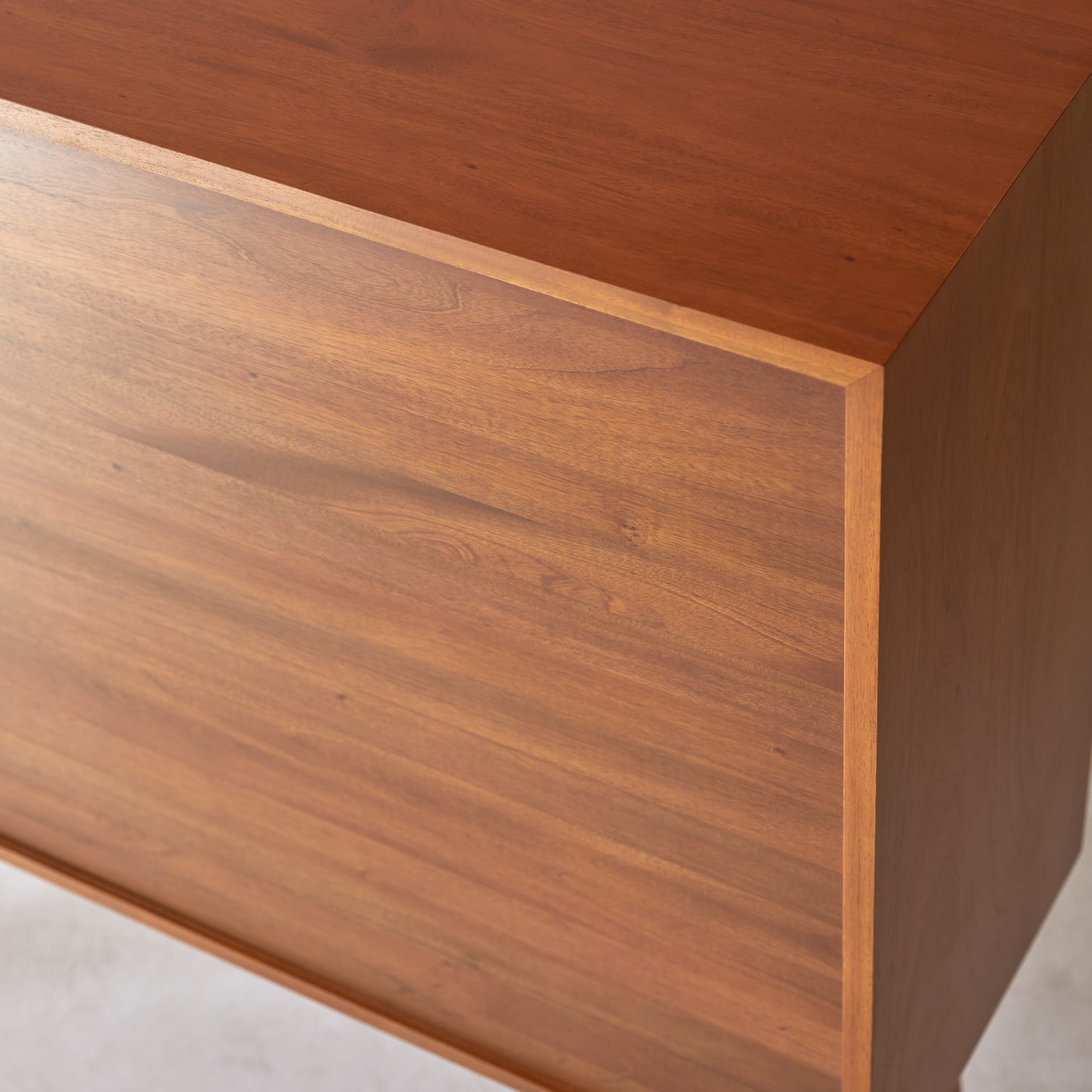 Tikamoon Magda highboard in solid mahogany, three-quarter view