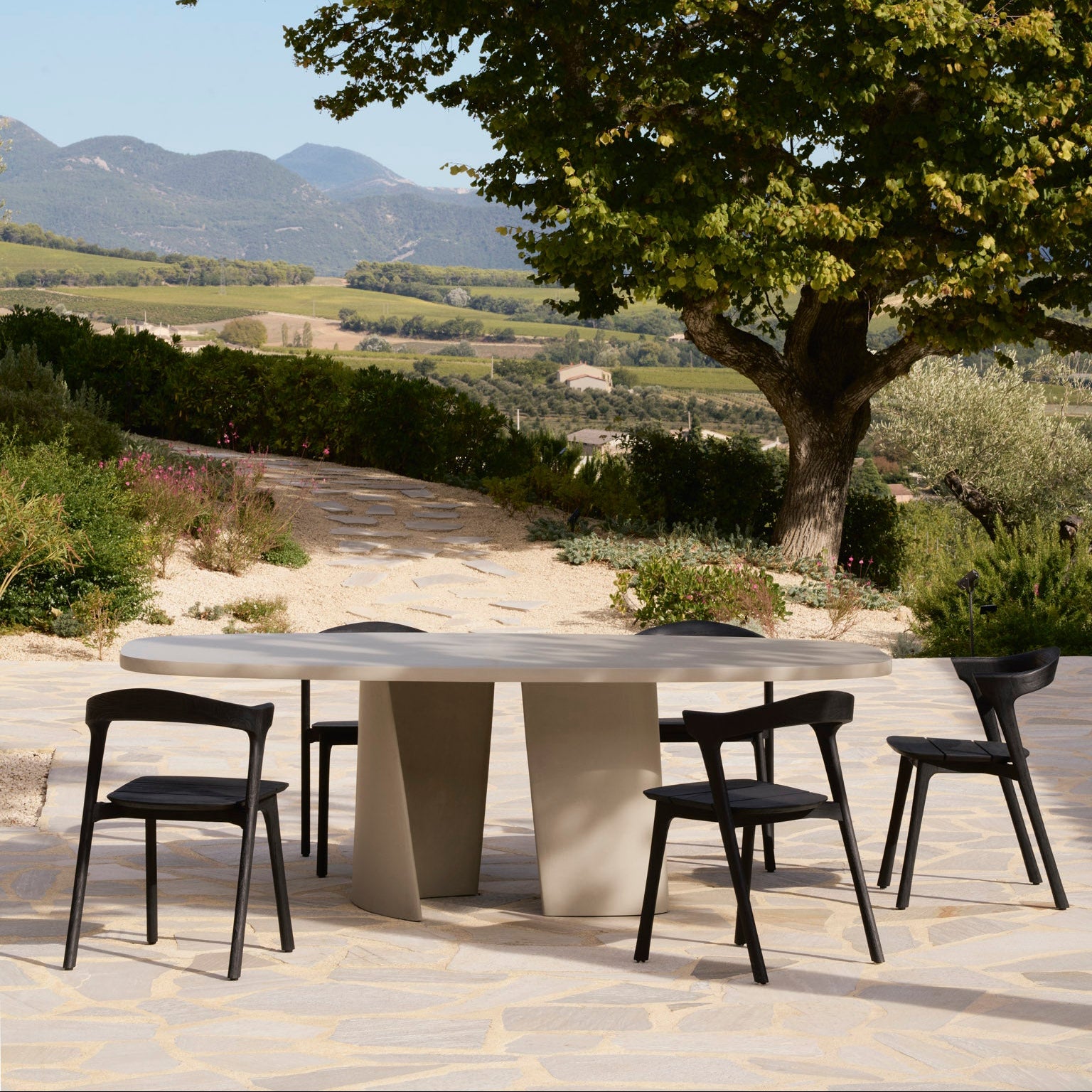Ethnicraft Canyon Outdoor Dining Table styled in a dining room