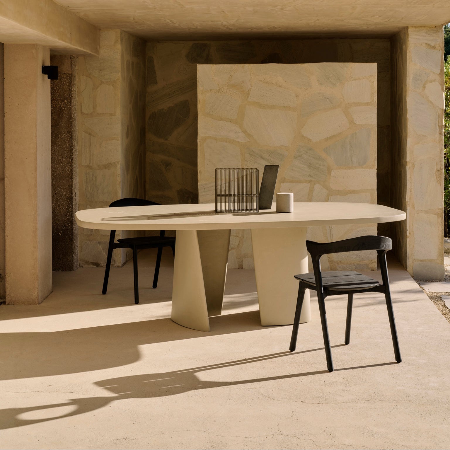 Ethnicraft Canyon Outdoor Dining Table styled in a dining room
