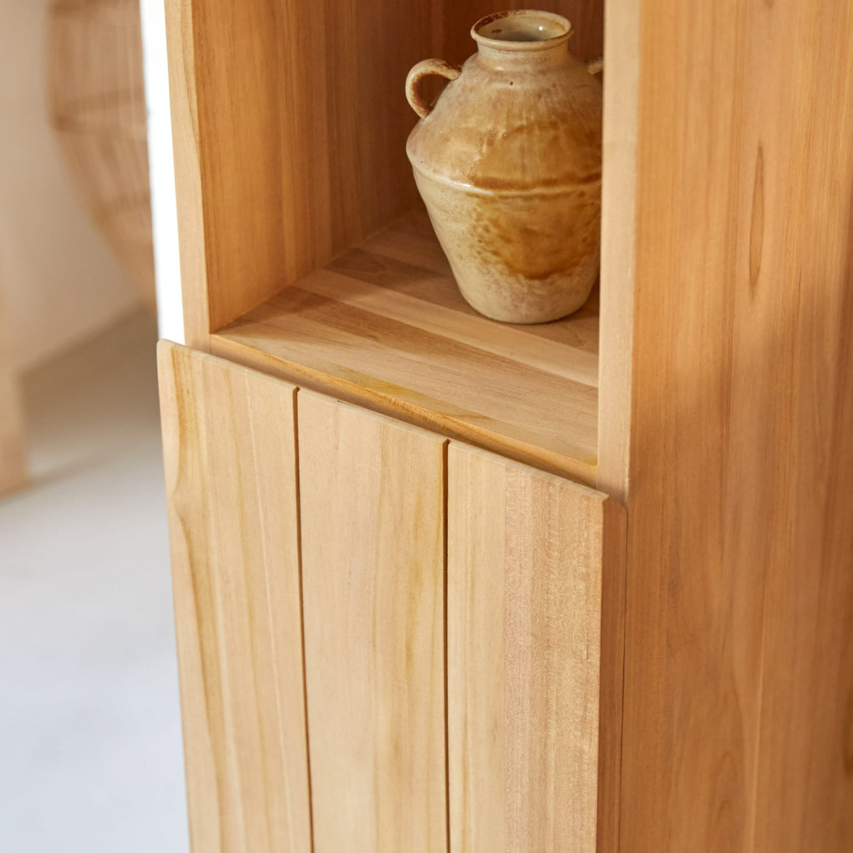 Tikamoon Jill wall-mounted bathroom cabinet in solid teak, three-quarter view