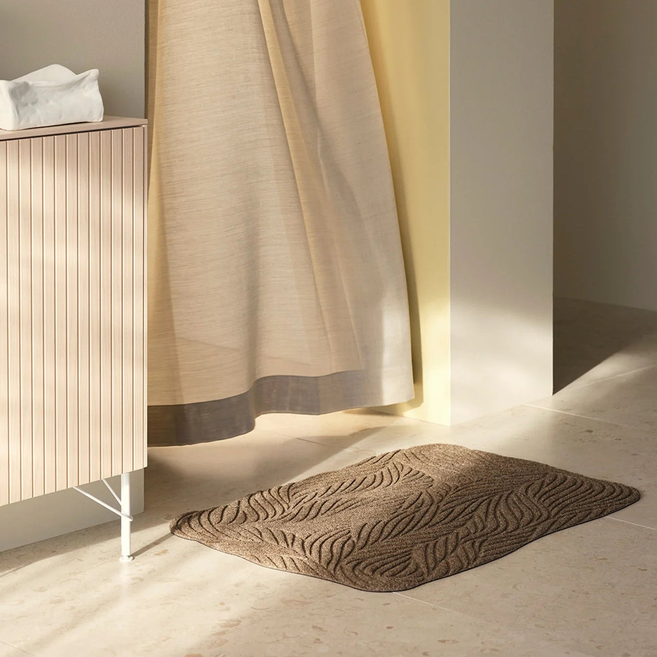 Heymat Twine All Weather Doormat doormat in Beige styled in an entryway, recycled PET yarn Norwegian design