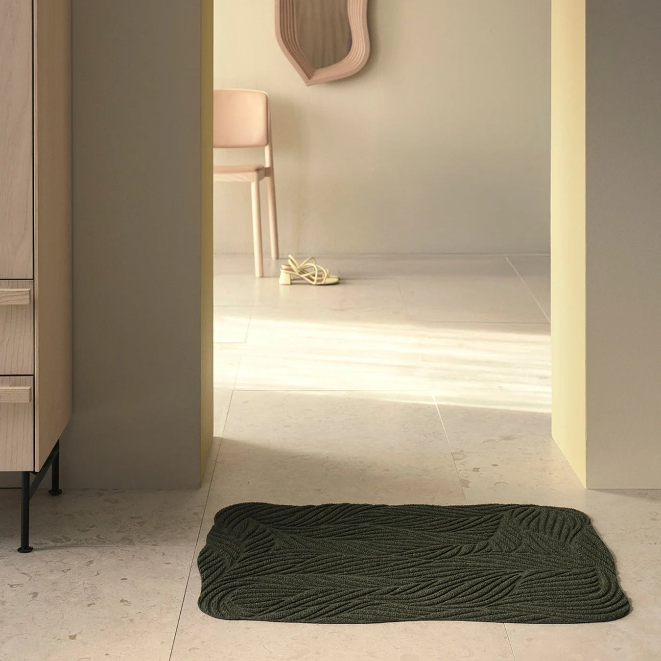 Heymat Twine All Weather Doormat doormat in Green styled in an entryway, recycled PET yarn Norwegian design