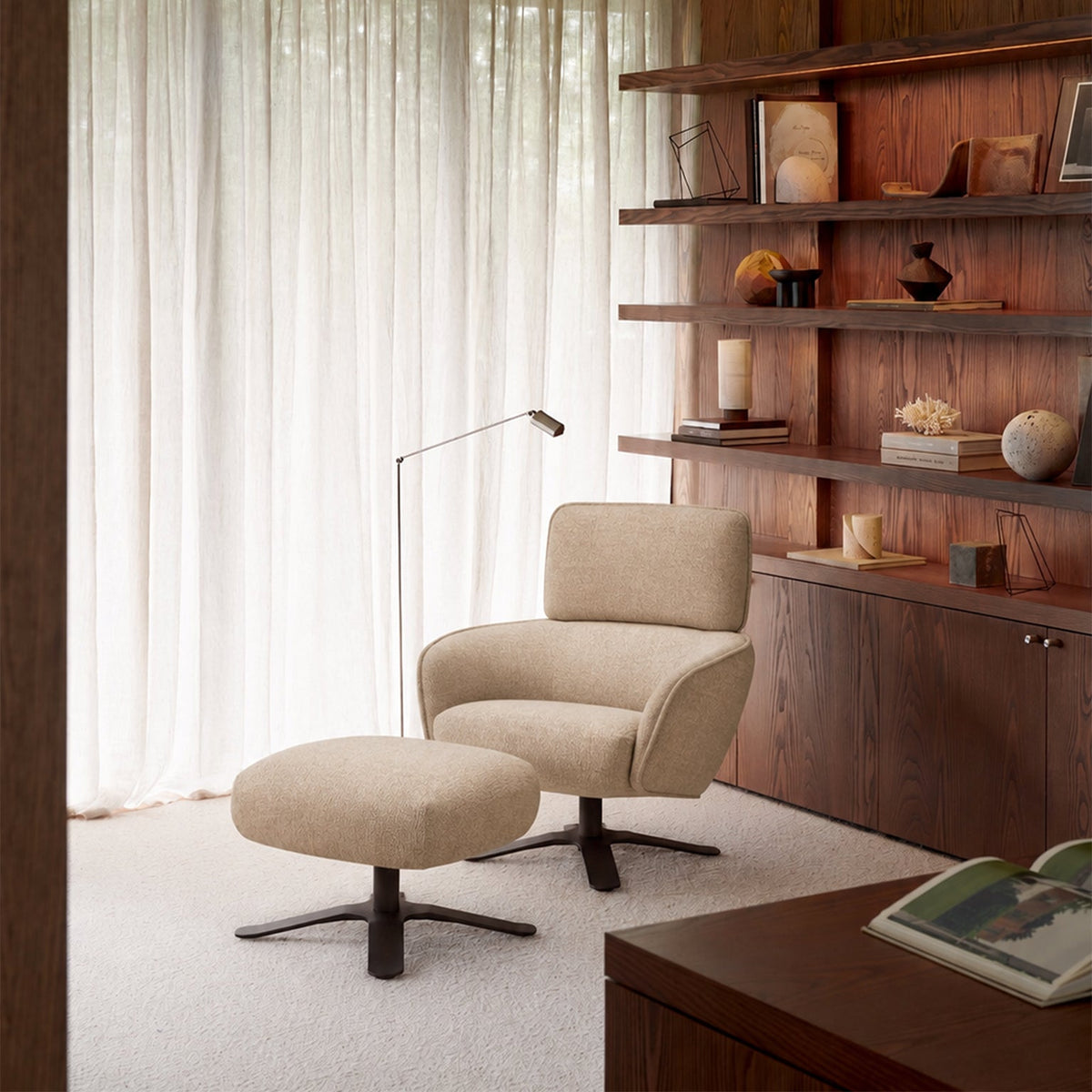 Ethnicraft Merge Footstool with Merge Lounge Chair in Loam, styled in a living room, recycled-content fabric
