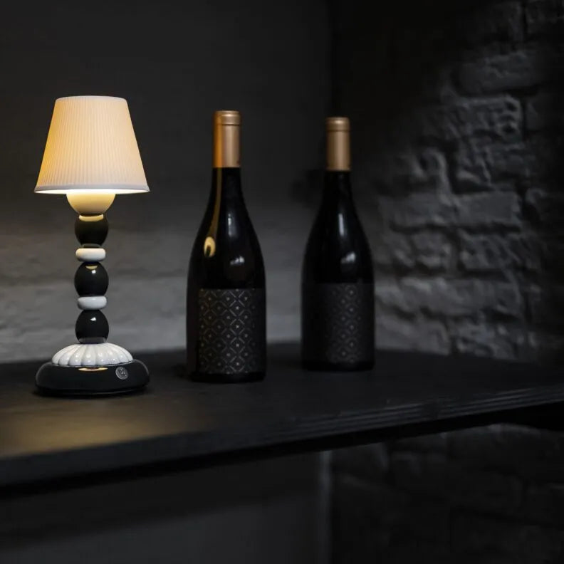 Lladró Sunflower Firefly Table Lamp in black handcrafted porcelain, from the Firefly collection, handcrafted in Valencia.