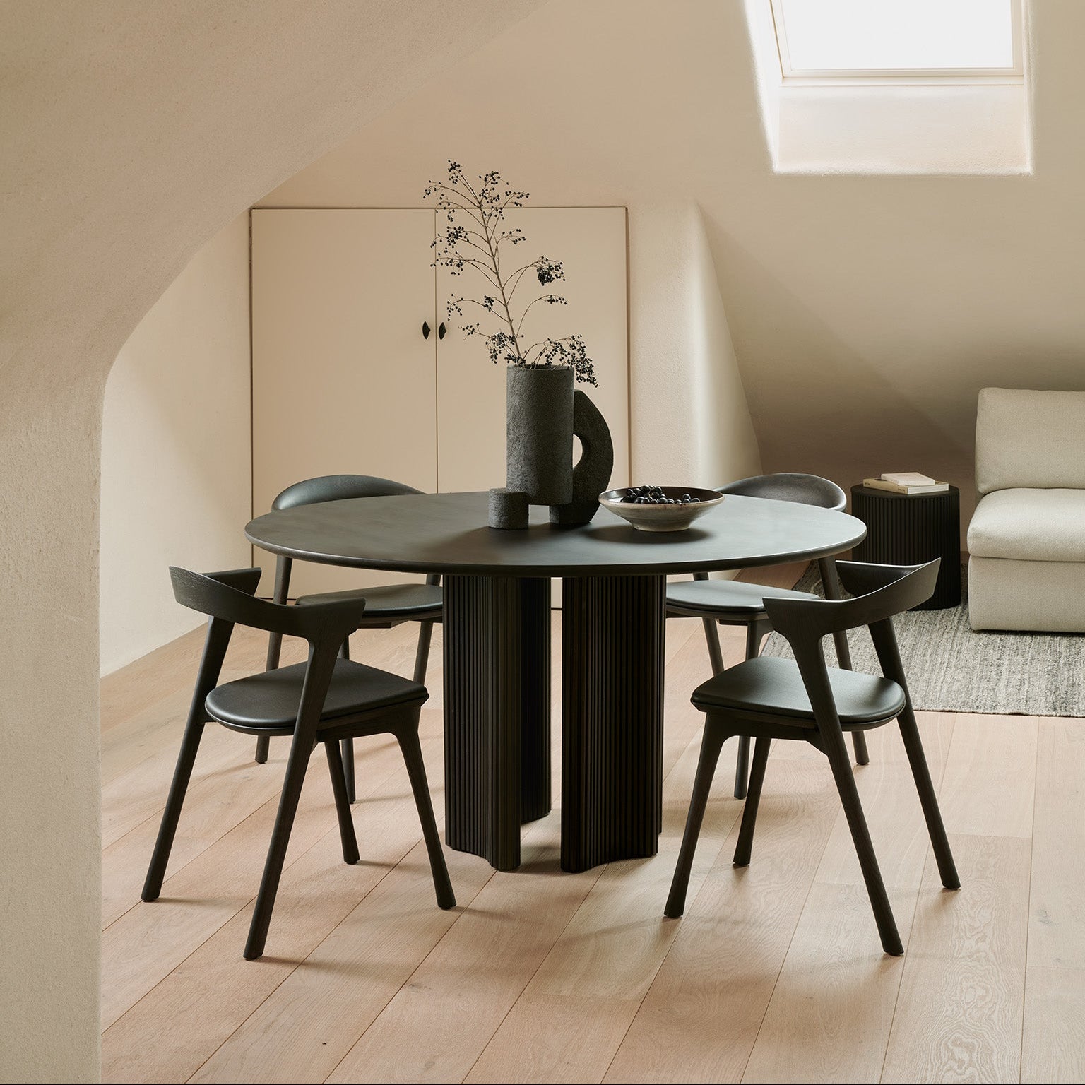 Ethnicraft Roller Max Dining Table styled in a dining room