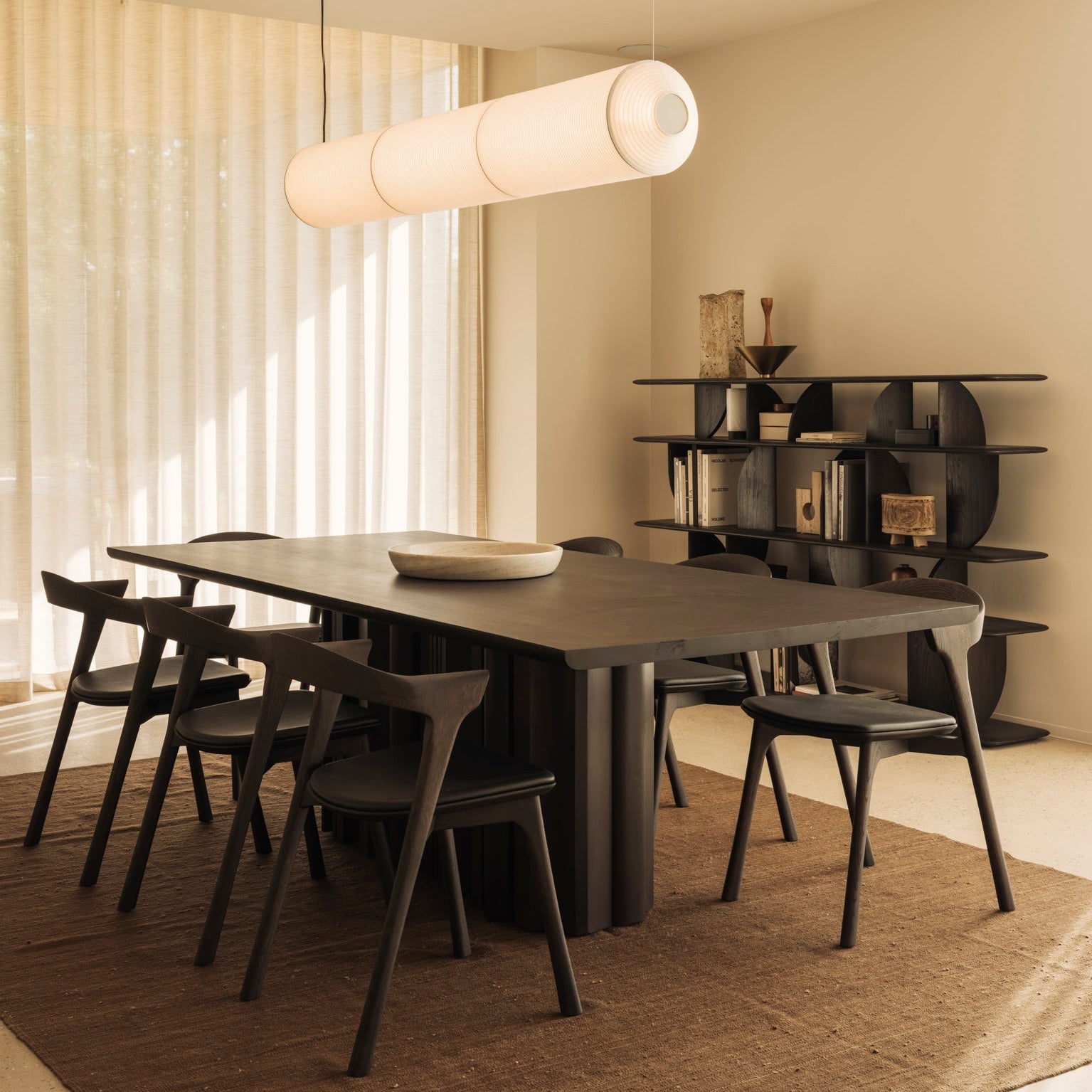 Ethnicraft Sequence Dining Table styled in a dining room