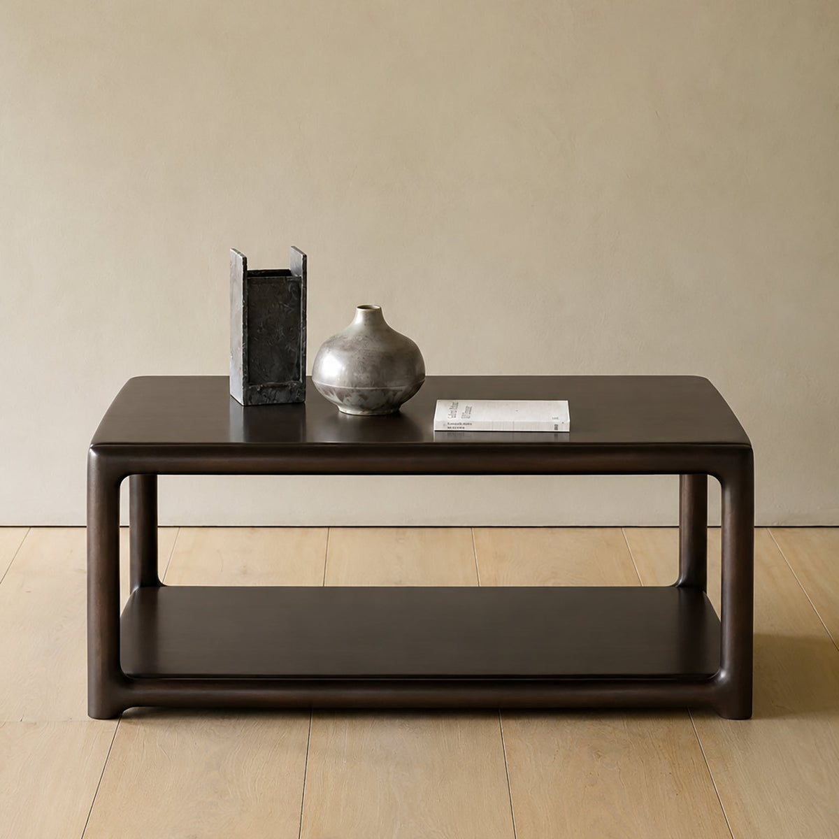 Ethnicraft Eda Coffee Table square in Rose Brown, styled in an interior setting, solid mahogany
