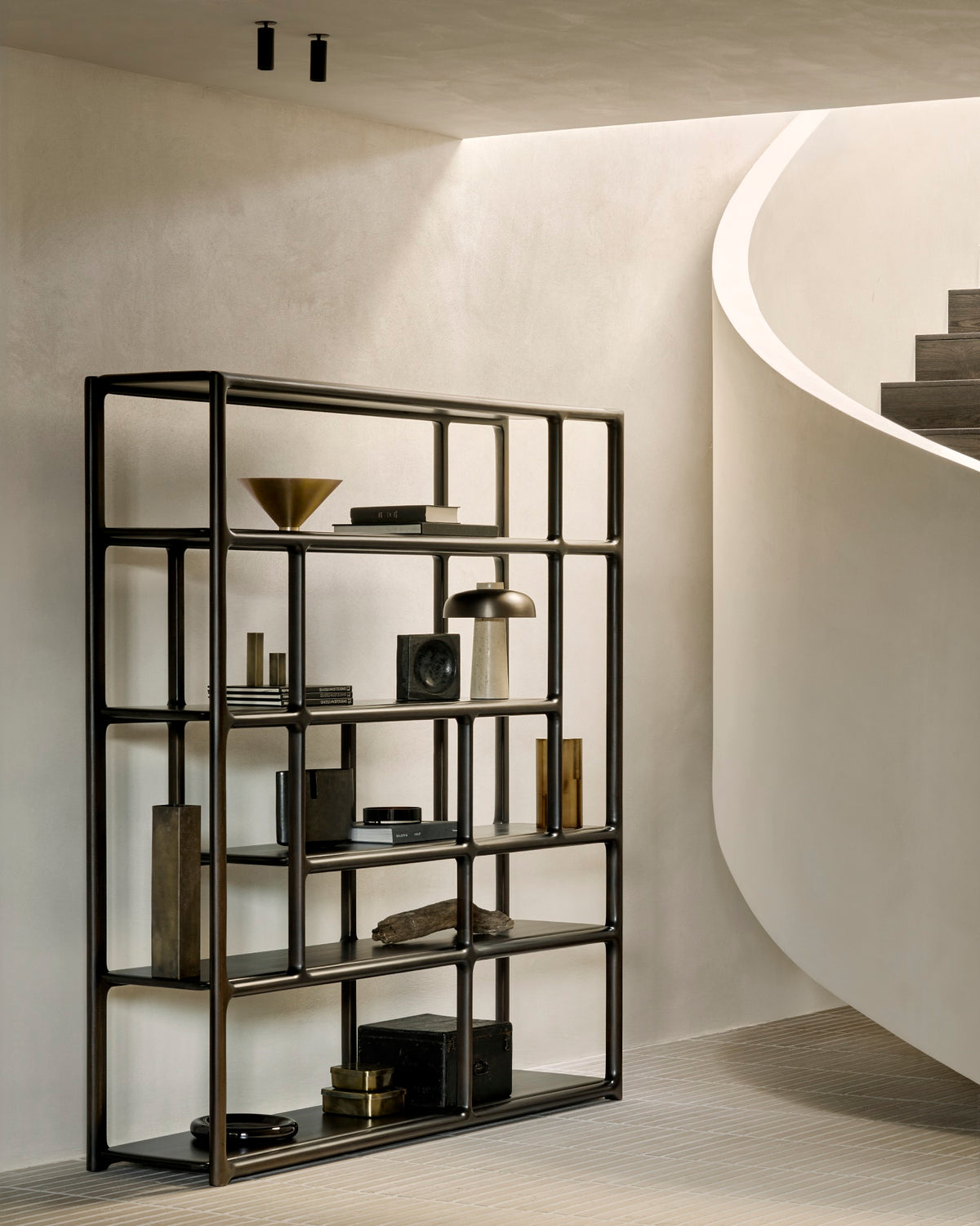 Ethnicraft Eda Rack tall in Rose Brown, styled in an interior setting, solid mahogany