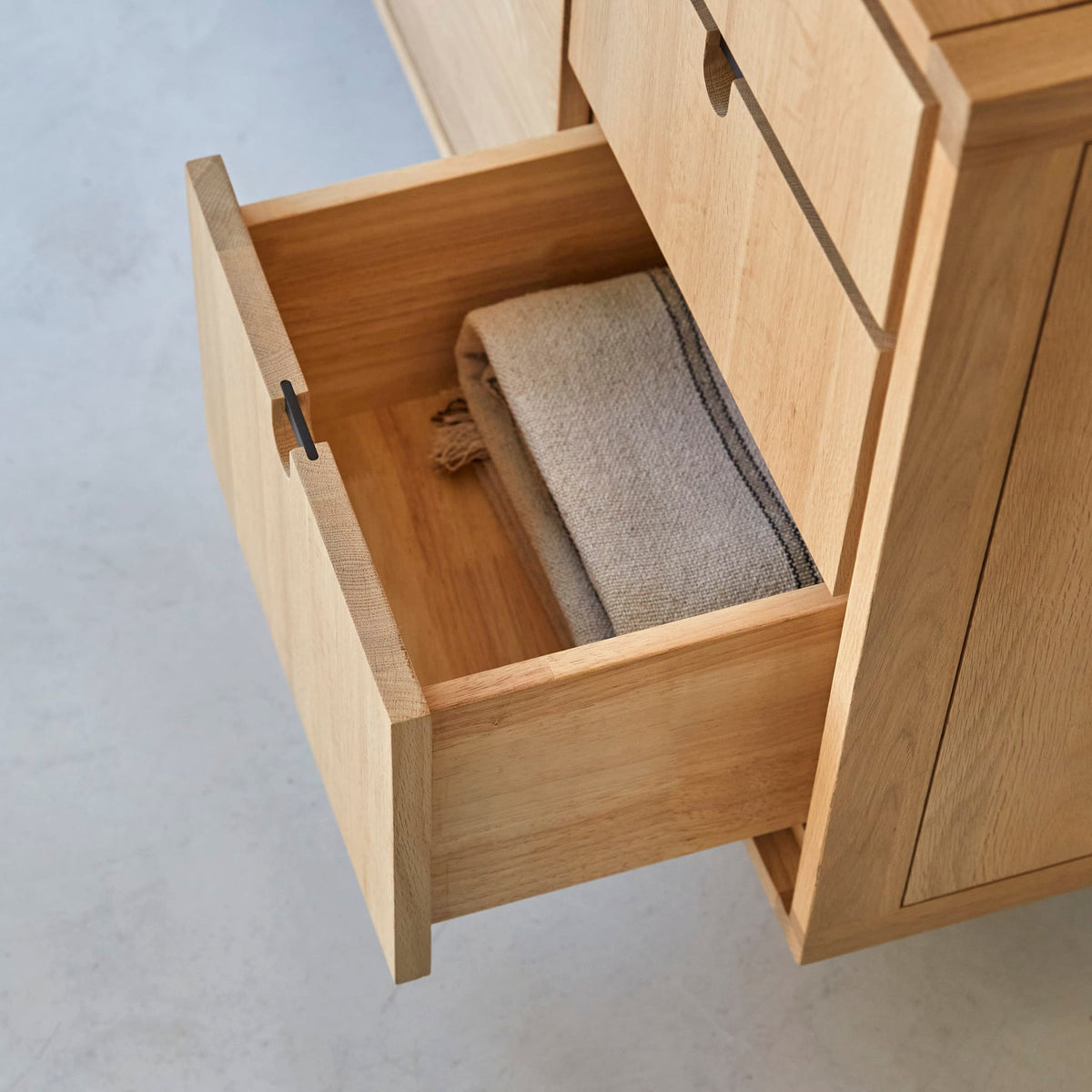 Tikamoon Jonàk sideboard in solid oak, detail of a drawer front