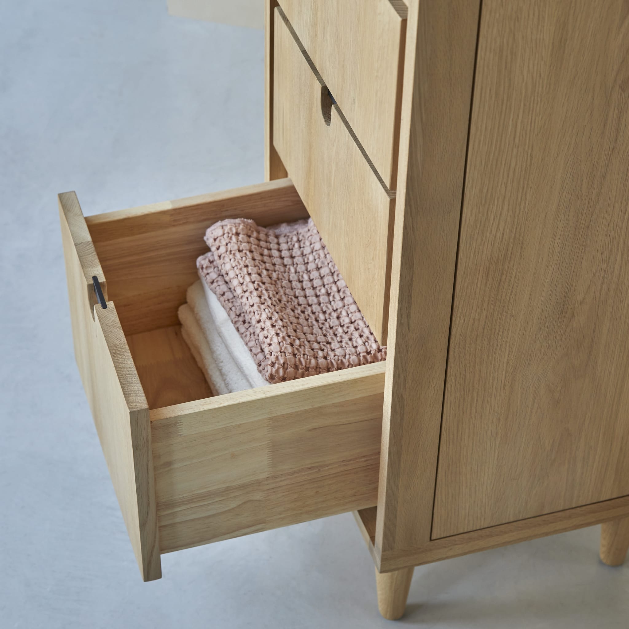 Tikamoon Jonàk tall bathroom cabinet in solid oak, side view