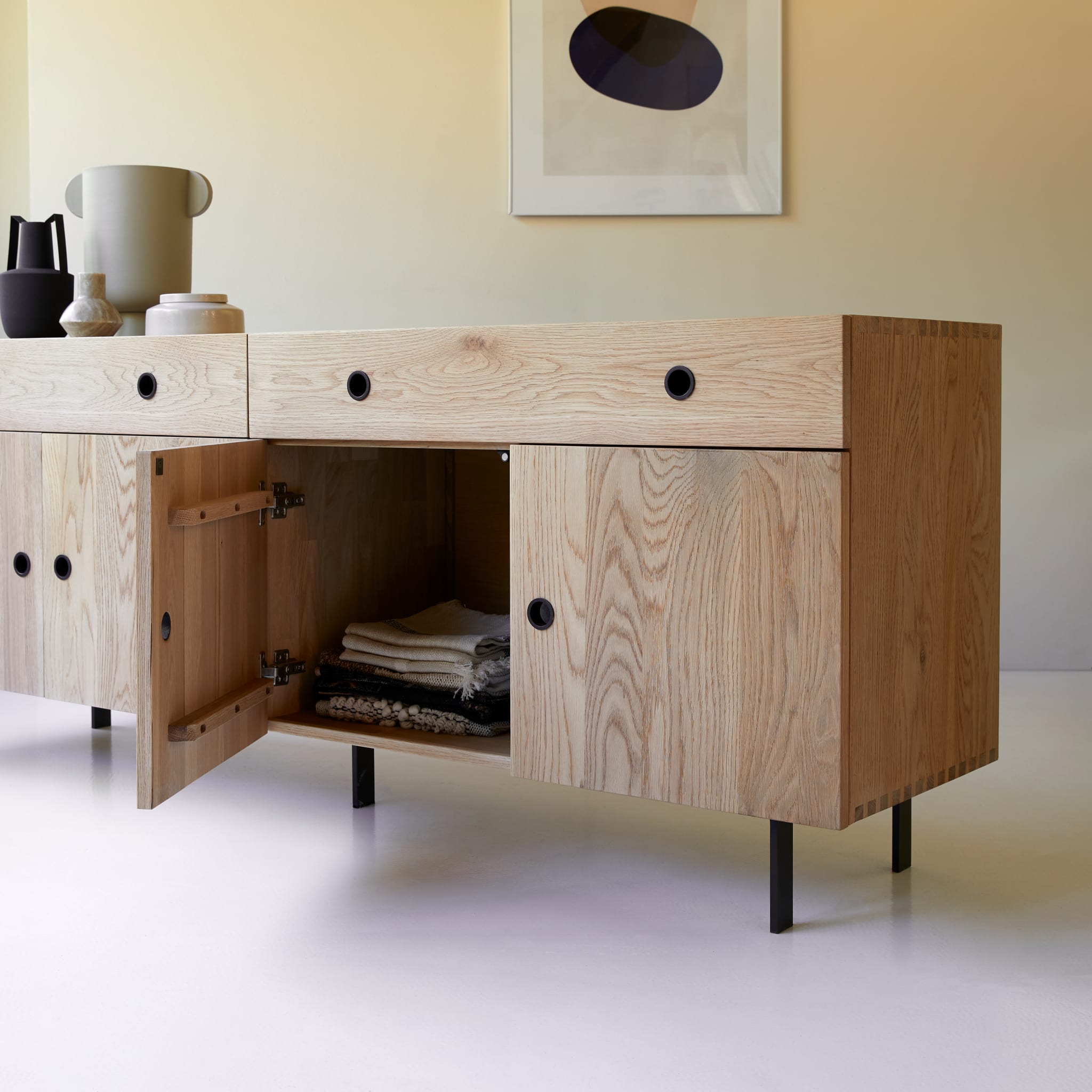 Tikamoon Jeanne sideboard in solid oak, three-quarter view