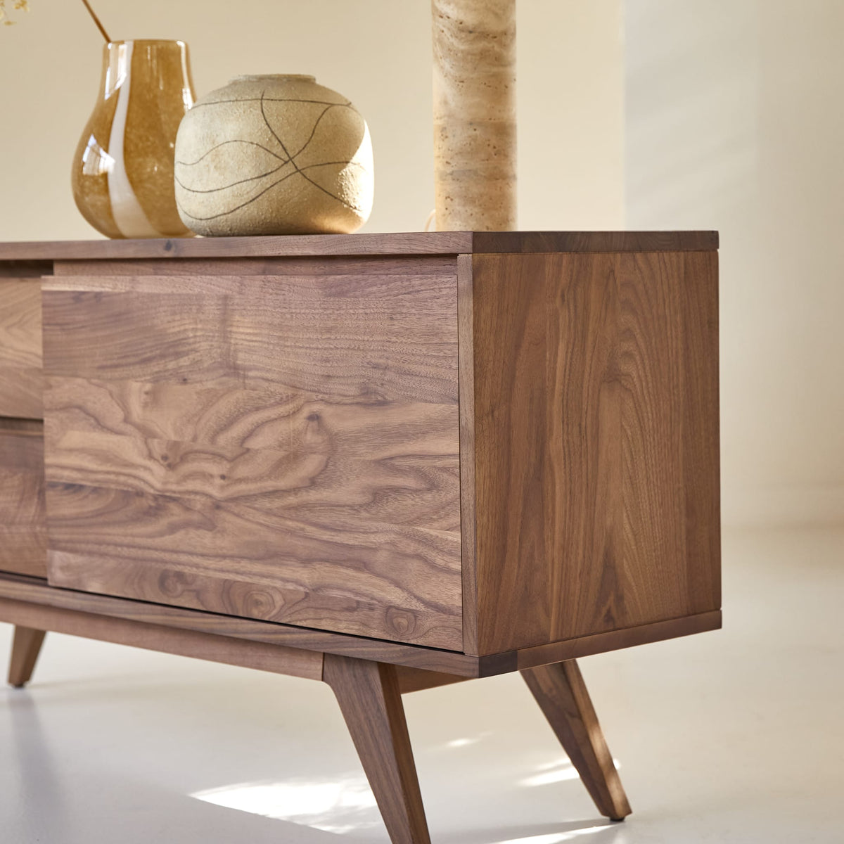 Tikamoon Esmée TV stand in solid walnut, diagonal view