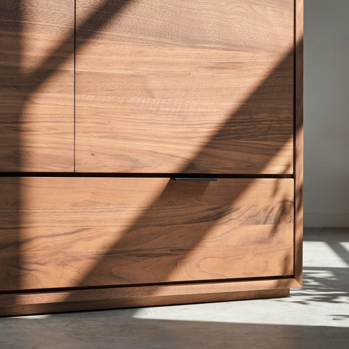 Tikamoon Senson sideboard in solid walnut, three-quarter view from the right