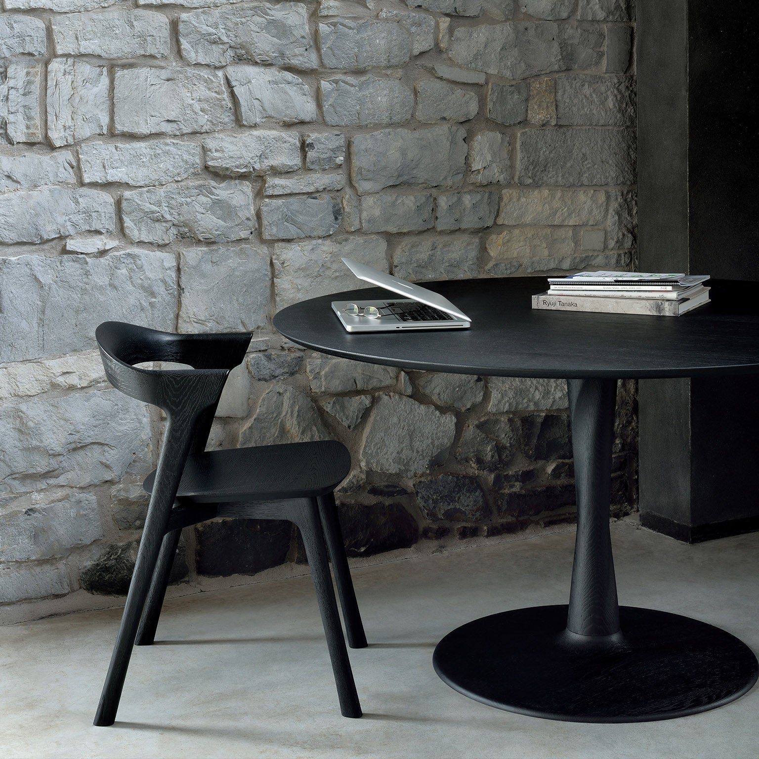 Ethnicraft Torsion Square Dining Table in oak styled in a dining room