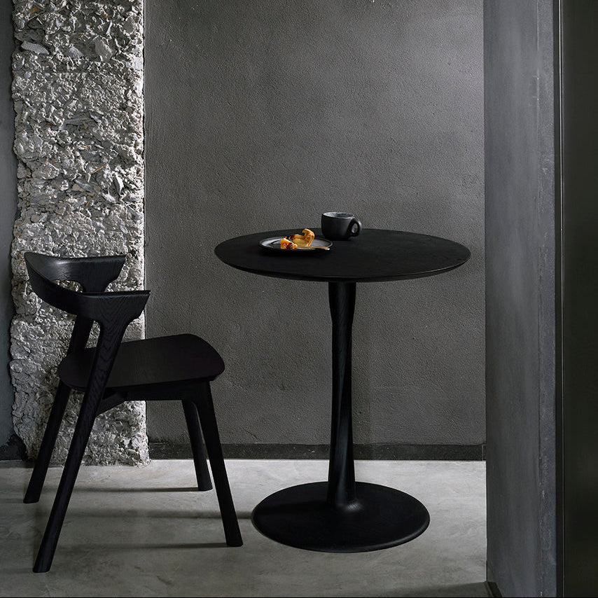 Ethnicraft Torsion Lounge Table in oak styled in a dining room