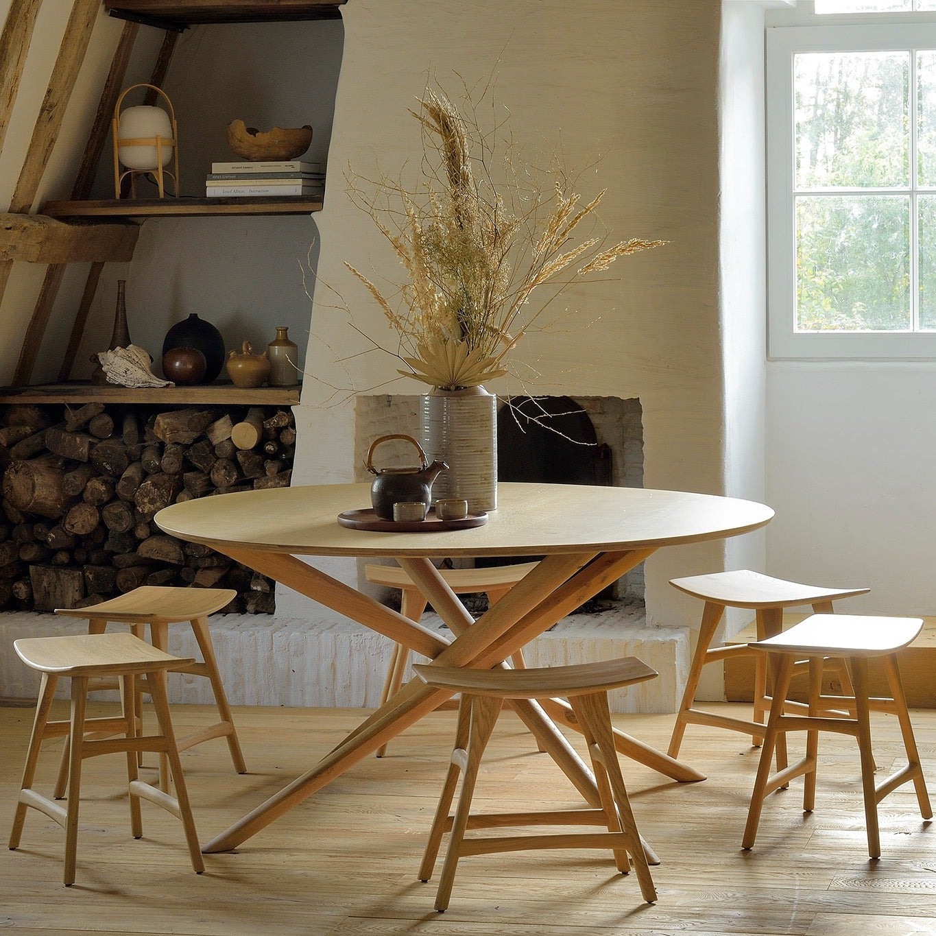Ethnicraft Mikado Dining Table in oak styled in a dining room