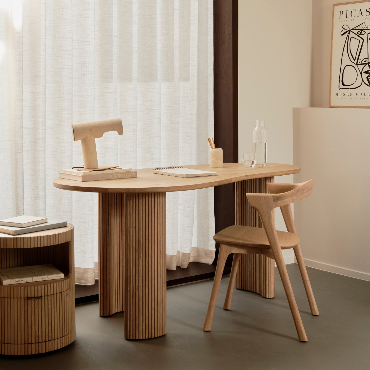 Ethnicraft Boomerang Drawer Unit in oak styled in a dining room
