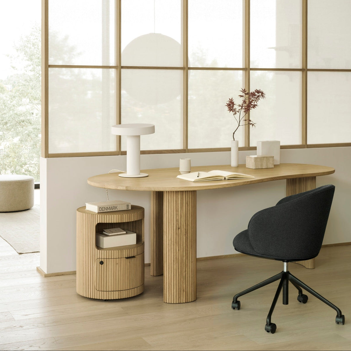 Ethnicraft Unda Office Chair in Charcoal at the Boomerang desk, styled in a home office, flat-weave upholstery