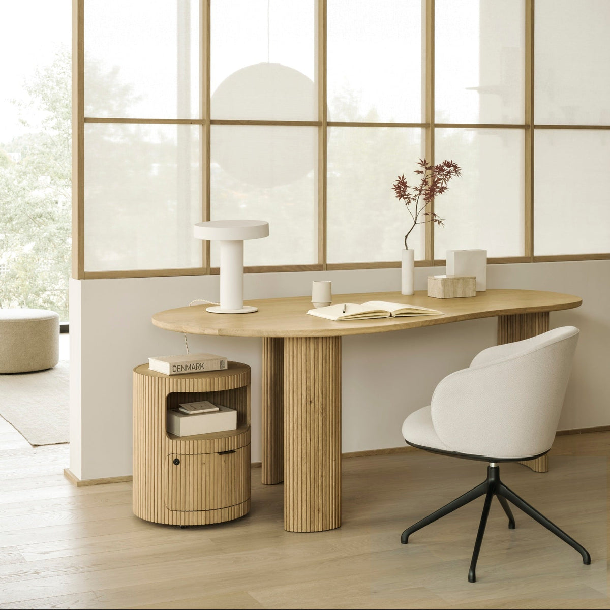 Ethnicraft Unda Office Chair in Salt at the Boomerang desk, styled in a home office, flat-weave upholstery