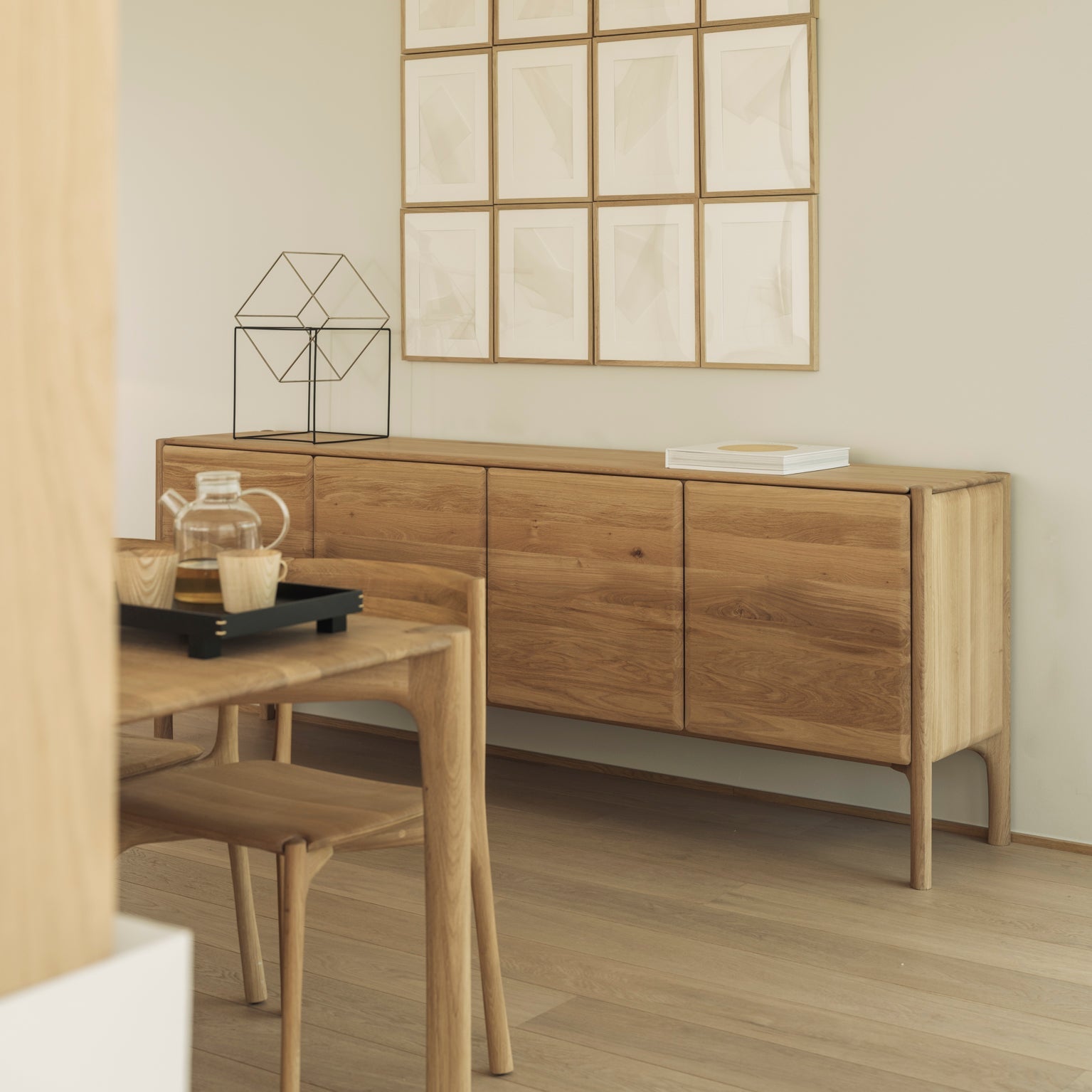 Ethnicraft PI Sideboard in oak styled in a dining room