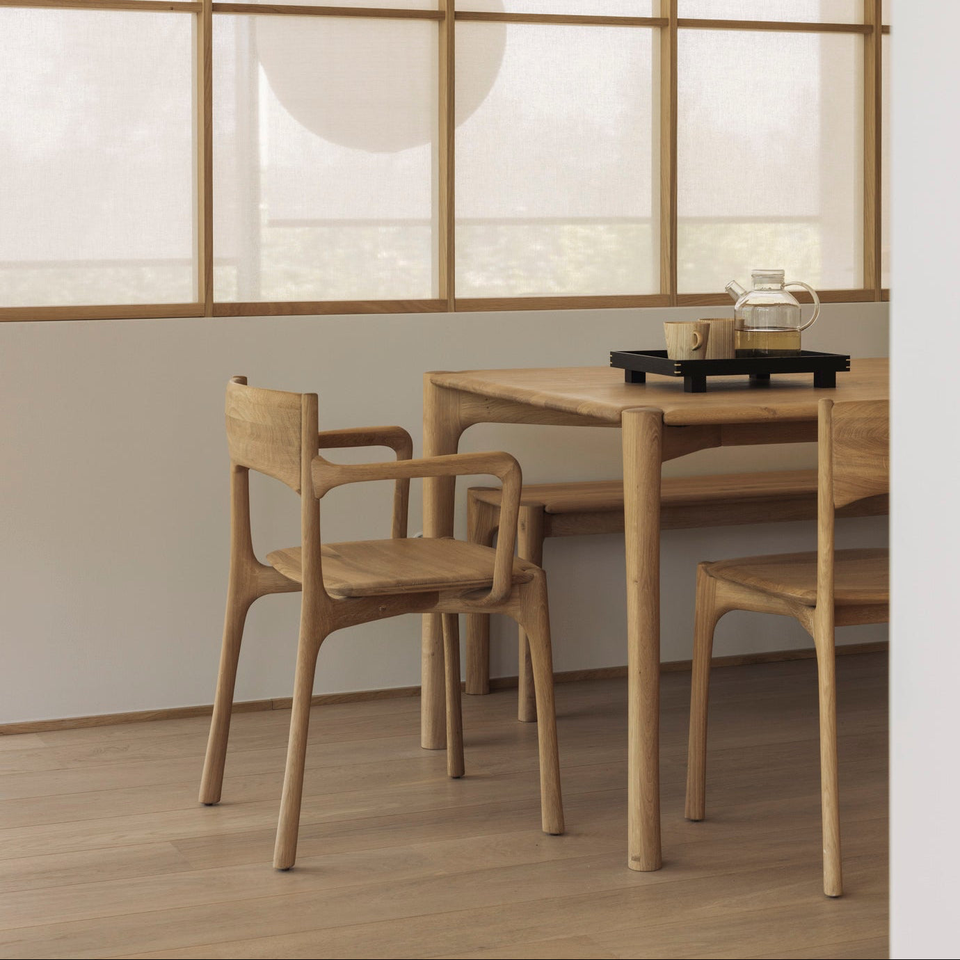 Ethnicraft Pi Dining Chair in oak styled in a dining room