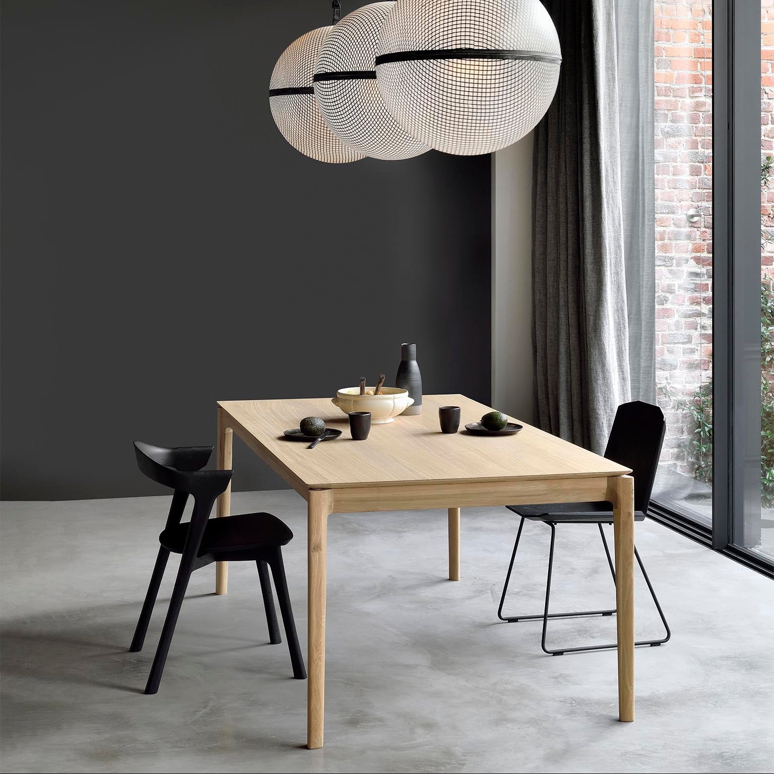 Ethnicraft Bok Dining Chair in oak styled in a dining room