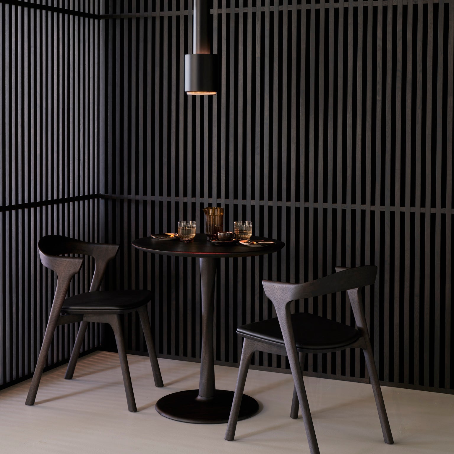Ethnicraft Torsion Lounge Table styled in a dining room