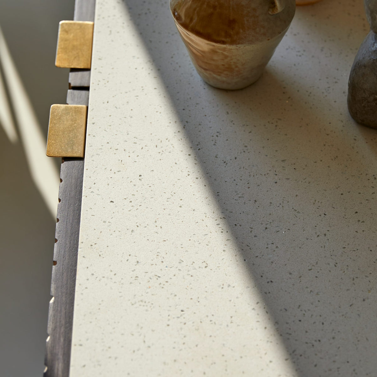 Tikamoon Bilal sideboard, close-up of the white terrazzo top