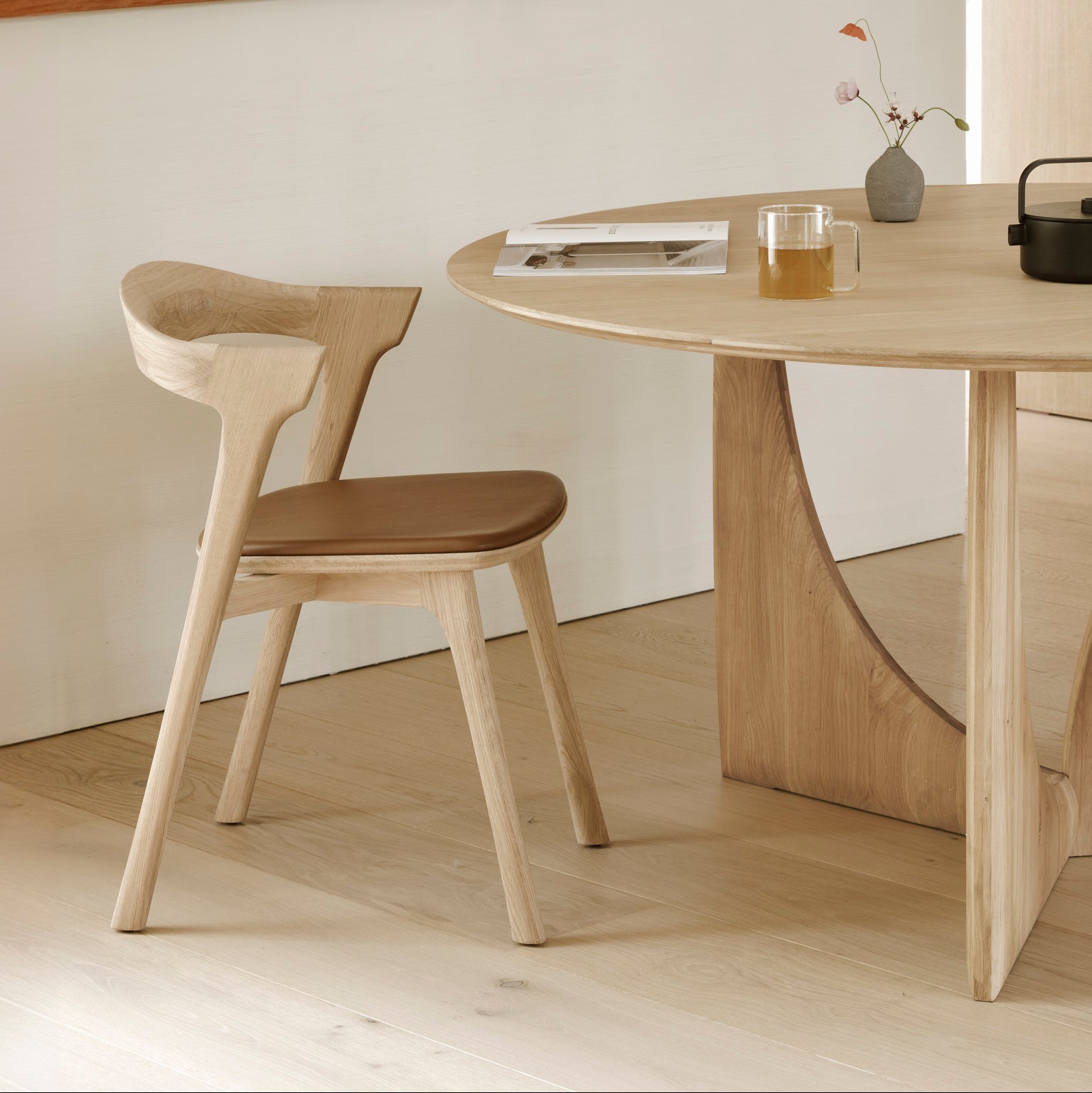 Ethnicraft Bok Dining Chair in oak styled in a dining room