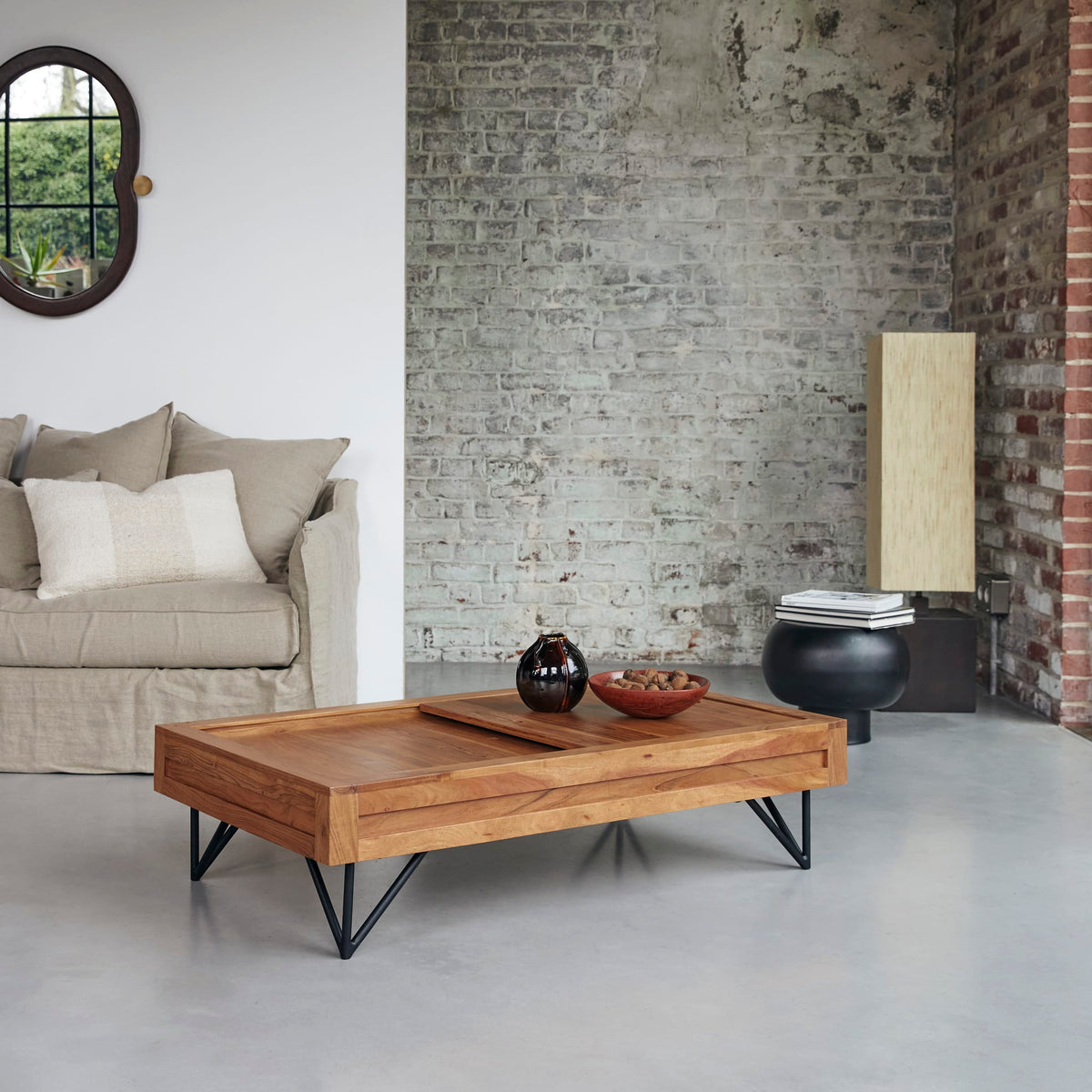 Bonnie acacia coffee table styled in a living room setting