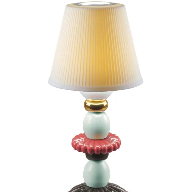 Lladró Lotus Firefly Table Lamp in handcrafted porcelain, from the Firefly collection, handcrafted in Valencia since 1953.
