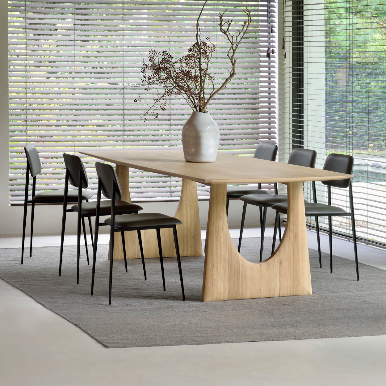 Ethnicraft Geometric Rectangle Dining Table in oak styled in a dining room