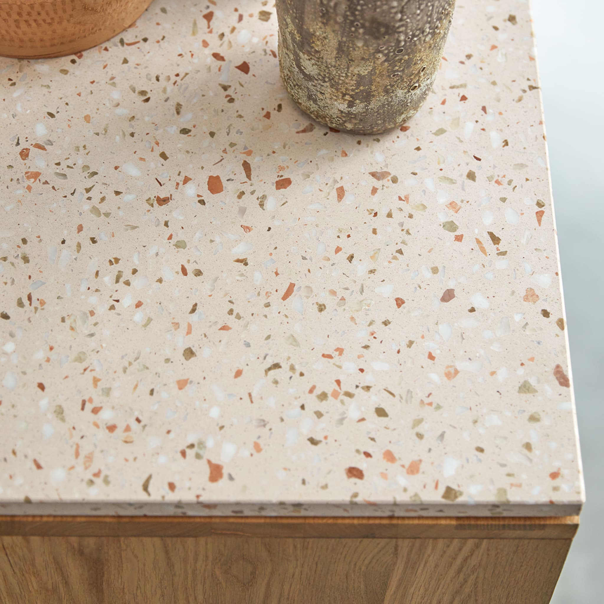 Tikamoon Miho console table in solid oak with a terrazzo top, side view
