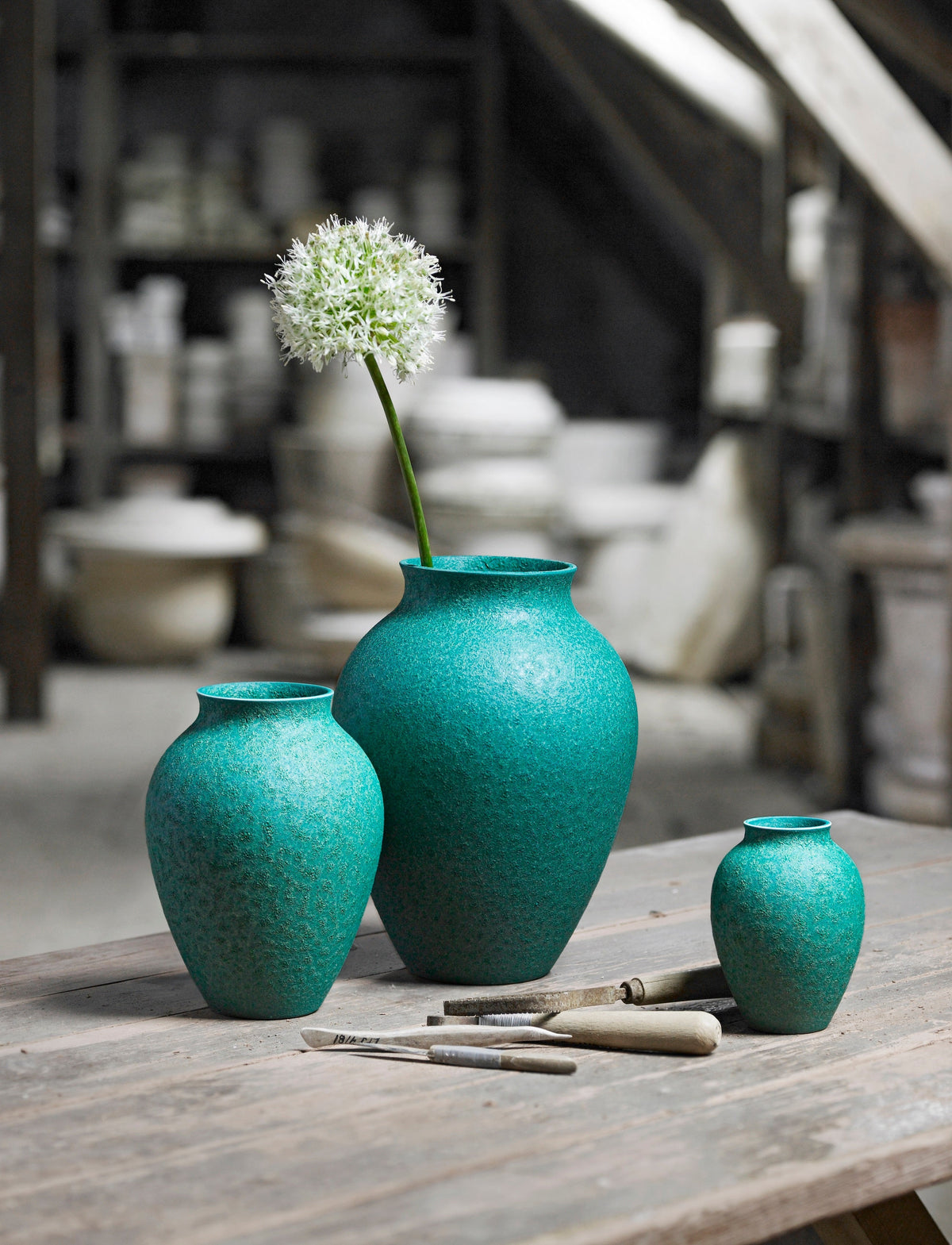 Knabstrup Vase in verdigris green, styled in an interior setting, glazed earthenware